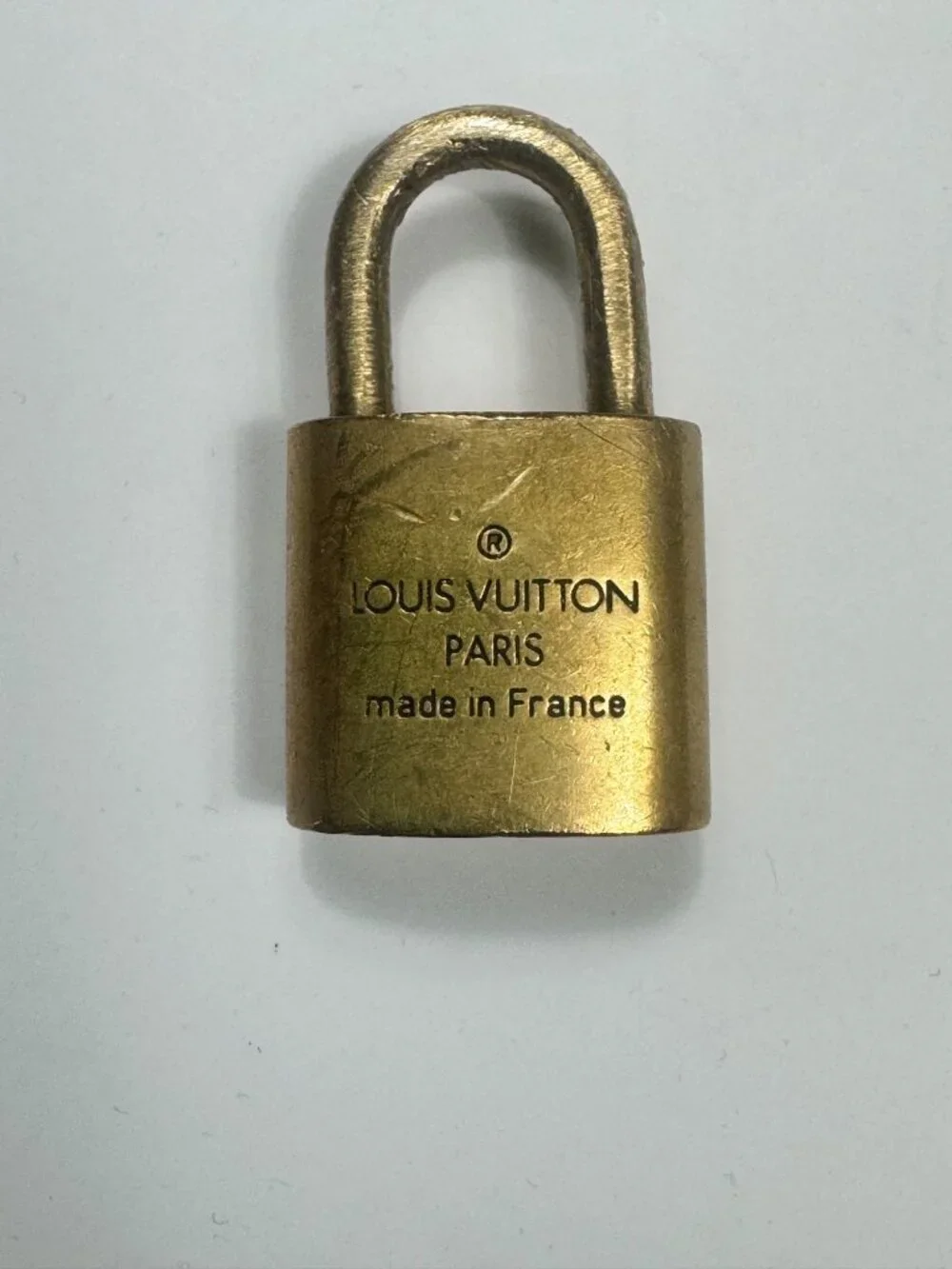 Authentic Louis Vuitton Lock No Key Gold Tone